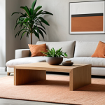 **A minimalist luxurious living room. Focus on natural light streaming through large windows, illuminating a solid oak coffee table and a linen sofa with clean lines. A single, striking piece of modern art hangs on a light gray wall. Include a few strategically placed green plants. The overall palette is neutral with a terracotta accent rug.**